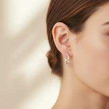 Load image into Gallery viewer, Brillante Hoop Earrings – Polished Oval Tube Hoops in .925 Sterling Silver
