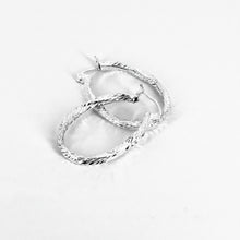 Load image into Gallery viewer, Brillante Hoop Earrings – Polished Oval Tube Hoops in .925 Sterling Silver
